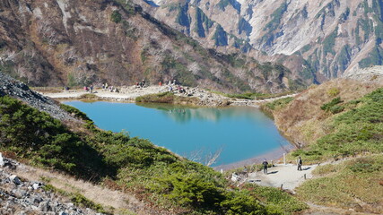 green colored pond at Hakuba, Japan, early autumn