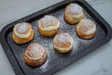 traditional home made swedish semlor pastry on a table