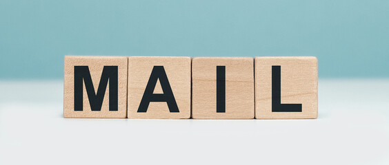 mail - word concept from wooden blocks on blue background
