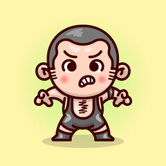 CUTE SHORT HAIR MALE WRESTLER IN BLACK OUTFIT LOOKS FURIOUS AND READY TO FIGHT.