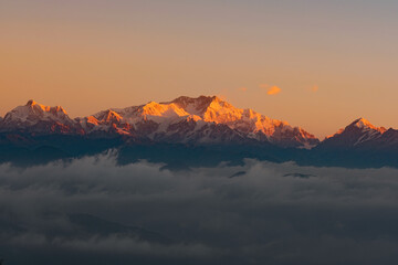 Fototapeta na wymiar Kanchenjunga,Kangchenjunga, Sleeping Buddha,Kumbhakarna, Goecha, Pandim,everest,lhotse,makalu views while trekking from Sandakfu to Phalut