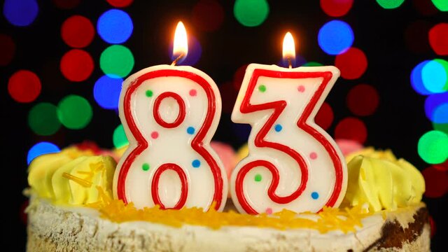 Number 83 Happy Birthday Cake With Burning Candles Topper.