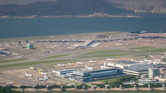A general view of international airport, planes take off and land. Timelapse.