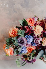 Obraz na płótnie Canvas Wedding flowers, bridal bouquet close-up. Decoration of roses, peonies and ornamental plants, close-up, selective focus.