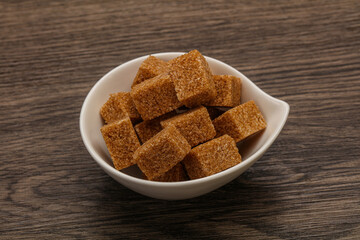 Cane sugar cubs in the bowl