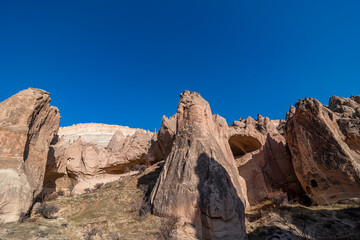 Fototapeta premium Beautiful historical and touristic places in Zelve valley , fairy chimneys, cave houses, Cappadocia, Nevsehir, Turkey