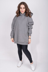Young girl in a gray sweatshirt