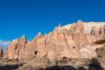 Fototapeta premium Beautiful historical and touristic places in Zelve valley , fairy chimneys, cave houses, Cappadocia, Nevsehir, Turkey