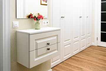 Modern furniture Wall mounted wooden shelves against cork wall background in living room