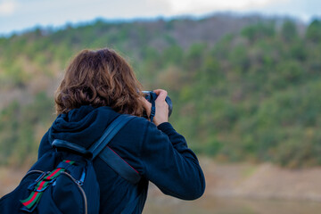 Fototapeta premium woman taking photo