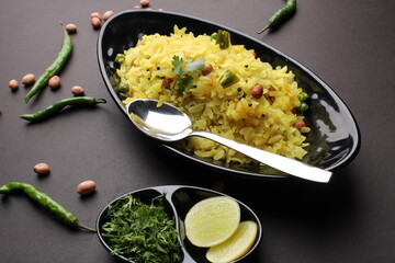 Indian Breakfast aalu Poha Also Know as kande Pohe made up of Beaten Rice or Flattened Rice.