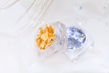 Sequins for manicure in a jar. Decor for nails and visage..