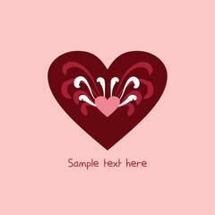 Chocolate heart with the image of a small pink heart with abstract wings of white and light chocolate color