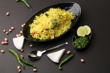 Indian Breakfast aalu Poha Also Know as kande Pohe made up of Beaten Rice or Flattened Rice.