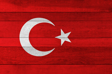 Turkey national flag painted on a wooden plank background.