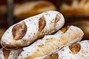 Many rustic fresh bread loaves
