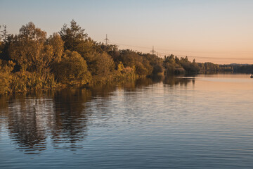 Beautiful sunset with reflections near Plattling, Isar, Bavaria, Germany