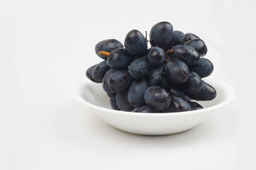 black grapes Image , Nashik , maharashtra , India , black grapes with white background