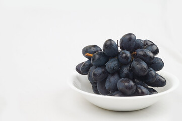 black grapes Image , Nashik , maharashtra , India , black grapes with white background