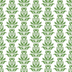 Seamless background with a floral pattern. Green leaves of creepers on a white background. Spring and summer theme. Endlessly repeating texture for fabrics, textiles, wallpaper, interiors, wrapping.