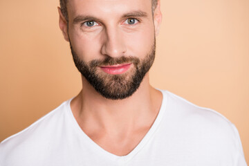 Obraz premium Cropped photo of young handsome stubble man happy positive good mood isolated over beige color background