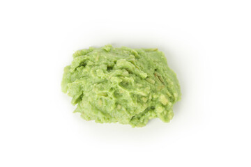 Fresh guacamole heap isolated on white background