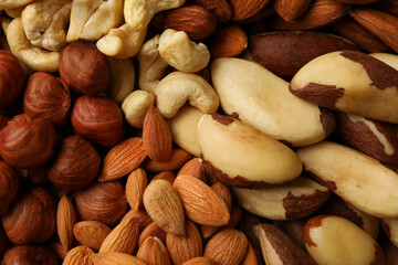 Different nuts on whole background, close up