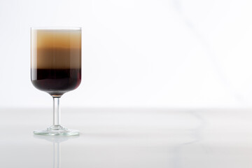 Copy space with B52 layered cocktail at white background