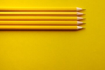 yellow pencils on a yellow background. screensaver