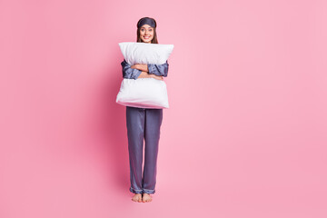 Photo portrait full body view of woman hugging pillow standing next to blank space isolated on...