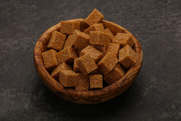 Cane sugar cubs in the bowl