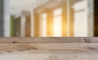 Background with empty wooden table. Flooring. Open space office interior with like conference room. Mockup. 3D