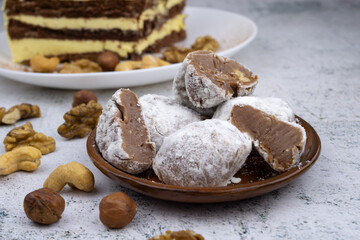 Chocolate truffles with walnuts, milk candy with walnuts, creamy cashew fudge, sweet dessert, layer cake, tiramisu, striped honey cake,