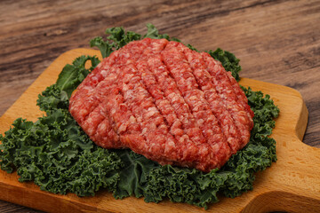 Raw beef burger cutlet for cooking