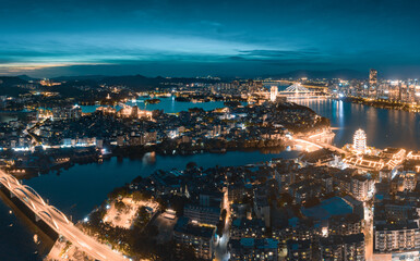 Aerial photograph of night scene of West Lake in Huizhou City, Guangdong Province, China