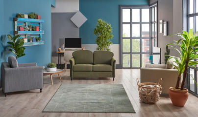 Blue and grey wall background green furniture sofa and armchair, working table background, poster...