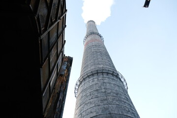 Almaty, Kazakhstan - 02.04.2021 : Smokestack and protective metal structure on the heating plant
