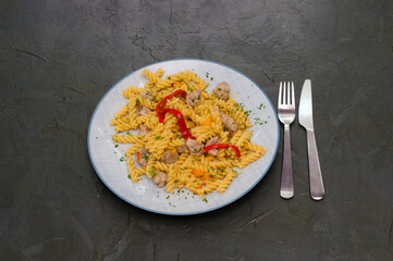 Italian pasta with meat, cheese, spices, parsley and red tomato sauce. Gourmet traditional food