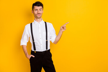 Portrait of funny skeptic guy wearing white shirt demonstrating copy space ad index select isolated...