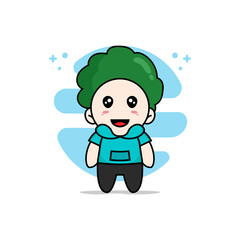 Cute kids character wearing broccoli costume.