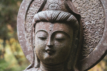 Fototapeta na wymiar Profile statue from Asian culture