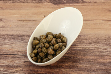 Tasty capers in the bowl