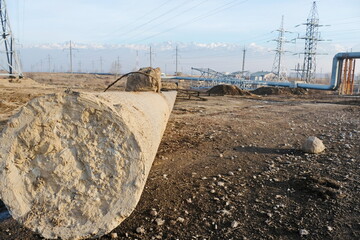 Almaty, Kazakhstan - 02.04.2021 : A broken column of the old transmission lines