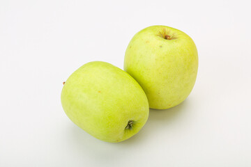 Two ripe green sweet apples