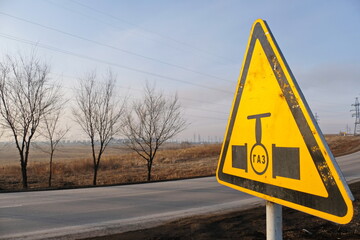 Warning sign with the inscription in Russian: gas