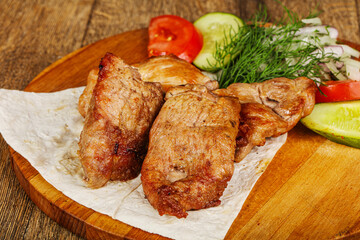 Grilled pork shashlick served vegetables