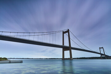 Fototapeta na wymiar long bridge architecture with blue water