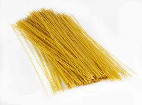 Closeup Shot Of Uncooked Spaghetti Isolated On A White Background