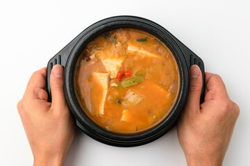 Cheonggukjang stew on a white background