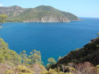 The beauty of the azure surface of the Mediterranean Sea under the rays of the sun fascinates any hiking enthusiast.